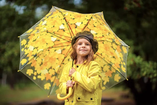 Happy funny child girl with umbrella in rubber boots — Stock Photo, Image