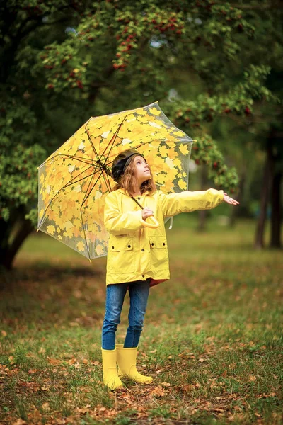 Happy funny child girl with umbrella in rubber boots — Stock Photo, Image