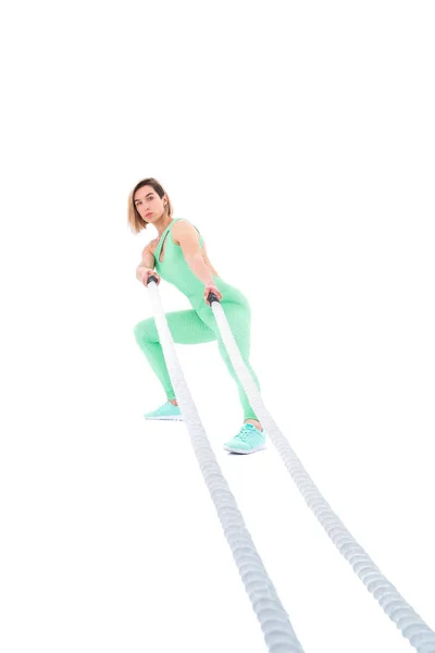 Woman doing exercises with battle rope. — Stock Photo, Image