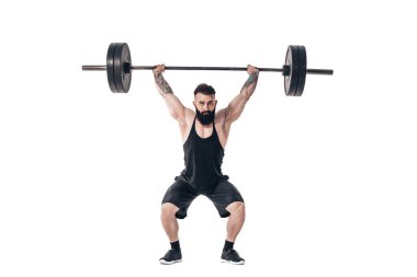 The technique of doing an exercise of deadlift with a barbell of a muscular strong tattooed bearded sports men on a white studio background. Isolate clipart