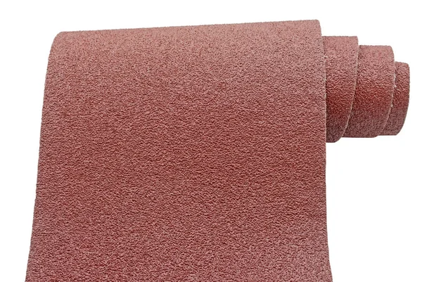 Roll of sandpaper isolated on white background