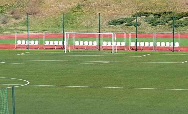 soccer goals on an outdoors mini football field