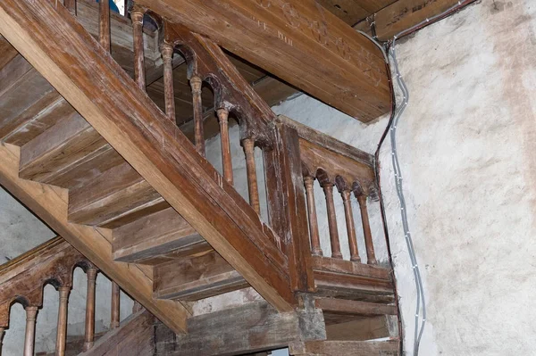internal wooden staircase in the old fortress tower