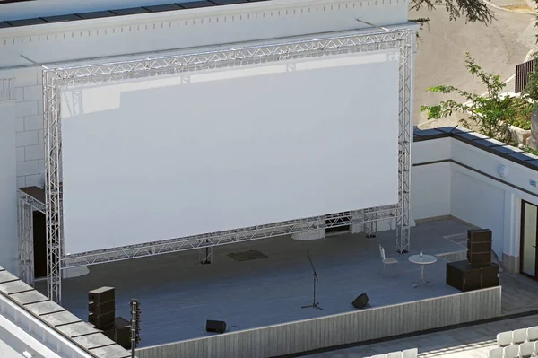 the Outdoor cinema with white projection screen