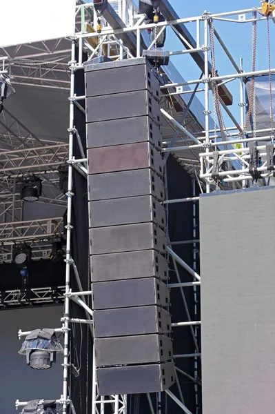 Big professional loud speaker system mounted on open air concert for powerful sound