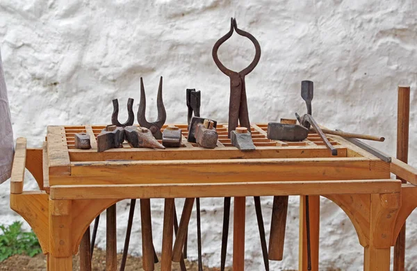 Blacksmith\'s tool. Hand-made antique tool for blacksmithing