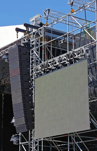 Big professional loud speaker system mounted on open air concert for powerful sound