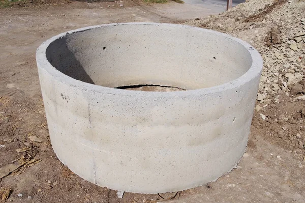 Reinforced concrete ring for the well and sewer