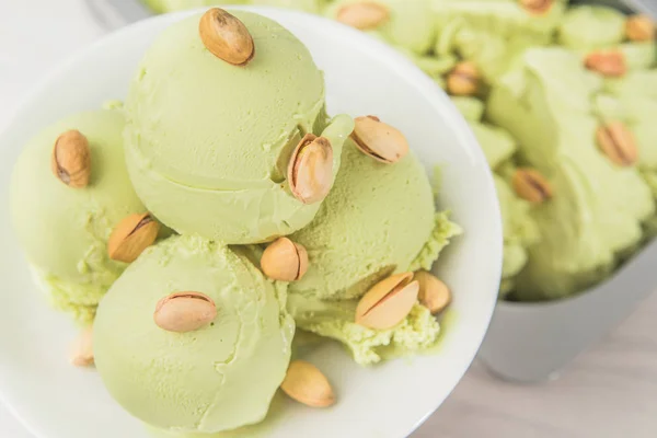 Ice cream with pistachio flavor and pistachios
