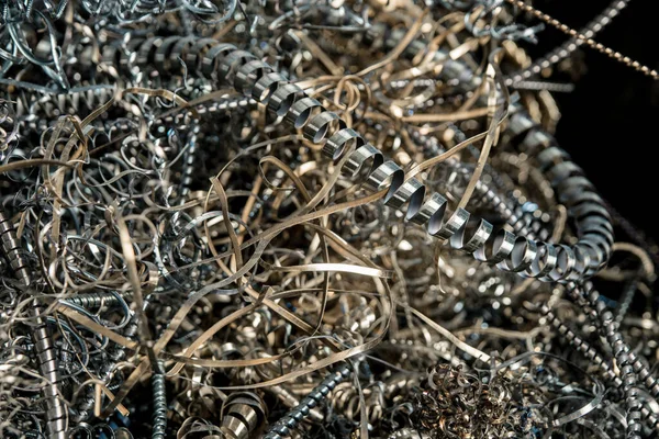 Metal shavings in production.Turning metal shavings