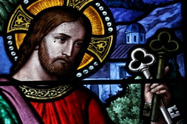 Aziz Ferreol Kilisesi. Lekeli cam pencere. İsa anahtarları Aziz Peter 'a veriyor. Aziz Fargeau. Fransa.