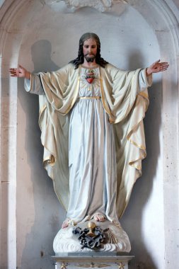 İsa 'nın Kutsal Kalbi. İsa 'yı diriltti. Heykel. Aziz Sauveur. Fransa.