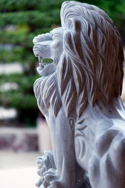 Quan Am Phat Dai Budist tapınağı. Aslan. Tapınağın koruyucusu. Mermer heykel. Bac Lieu. Vietnam. .