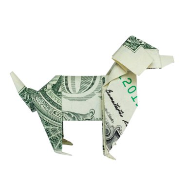 Beyaz arka plan üzerinde para Origami sağ tarafında köpek ile gerçek bir dolarlık banknot katlanmış profil içinde izole