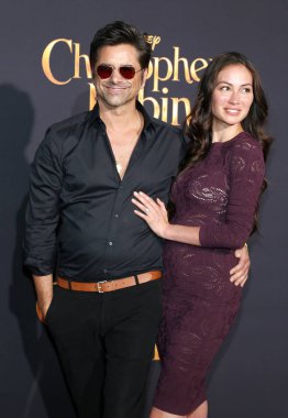 John Stamos ve Caitlin Mchugh, Los Angeles premiere ' 30 Temmuz 2018 üzerinde Burbank, ABD Walt Disney stüdyolarında yapılan zincirleme Christopher.