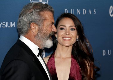 Mel Gibson ve Rosalind Ross Elysium sanat'ın 12 yıllık cennet şenlikte Los Angeles, ABD özel mekan 5 Ocak 2019 düzenlenen.