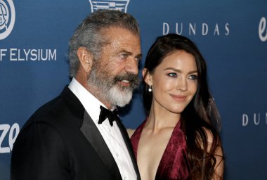 Mel Gibson ve Rosalind Ross Elysium sanat'ın 12 yıllık cennet şenlikte Los Angeles, ABD özel mekan 5 Ocak 2019 düzenlenen.