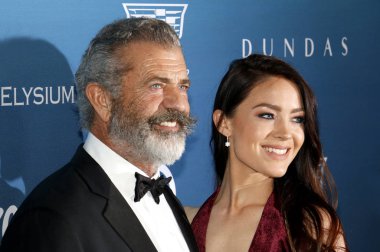 Mel Gibson ve Rosalind Ross Elysium sanat'ın 12 yıllık cennet şenlikte Los Angeles, ABD özel mekan 5 Ocak 2019 düzenlenen.