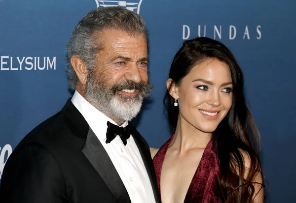 Mel Gibson ve Rosalind Ross Elysium sanat'ın 12 yıllık cennet şenlikte Los Angeles, ABD özel mekan 5 Ocak 2019 düzenlenen.