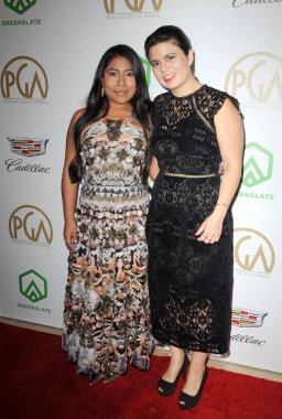 Yalitza Aparicio ve Gabriela Rodriguez 30 yıllık üreticileri Guild Ödülleri'nde 19 Ocak 2019 Beverly Hills, ABD Beverly Hilton Otel'inde düzenlenen.