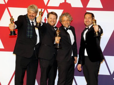 Ian Hunter, J.D. Schwalm, Paul Lambert ve Tristan Myles, 91 yıllık Akademi Ödülleri - basın odası Loews Hotel Hollywood, ABD'de 24 Şubat 2019 düzenlenen.