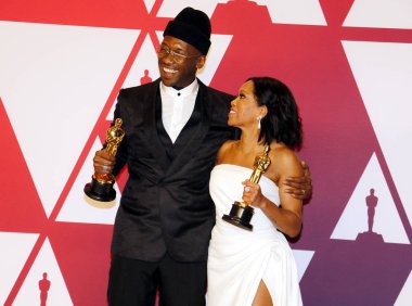 Regina King ve Mahershala Ali, 91 yıllık Akademi Ödülleri - basın odası Loews Hotel Hollywood, ABD'de 24 Şubat 2019 düzenlenen.