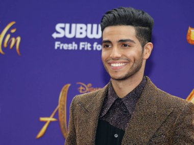aktör Mena Massoud 21 Mayıs 2019 tarihinde Hollywood'daki El Capitan Tiyatrosu'nda düzenlenen 'Aladdin'in Los Angeles galasında.