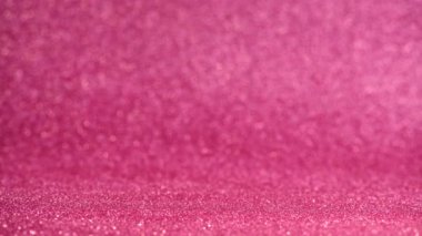 Pembe simli arka plan odak ve odak alanı dışında ve hareketli bokeh içinde yansımalar