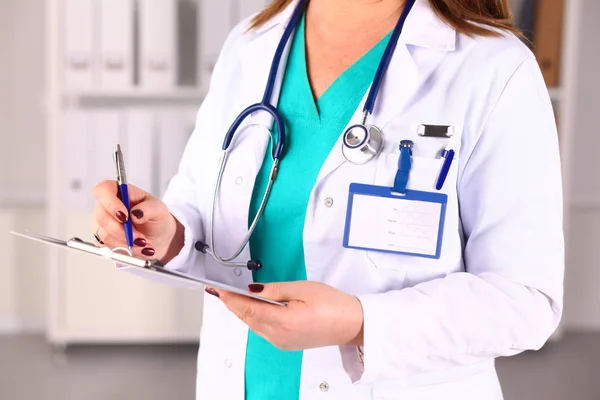 Portrait of happy medical doctor woman in office Royalty Free Stock Images