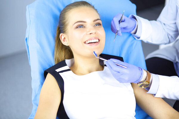 beautiful girl in the dental chair on the examination at the dentist