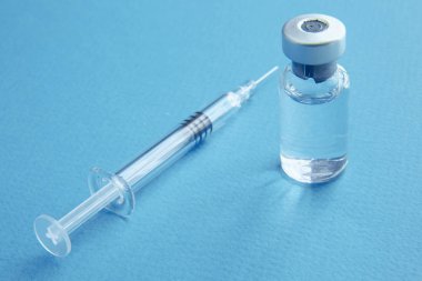 Syringe and vials closeup with selective focus. Medical and Hea