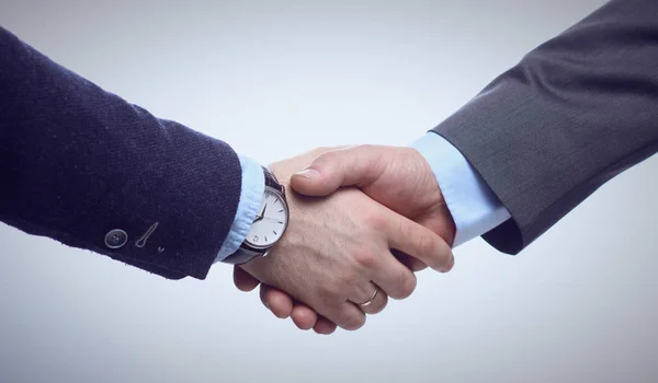 Um aperto de mão. Dois homens de negócios apertando as mãos com cada dente — Fotografia de Stock