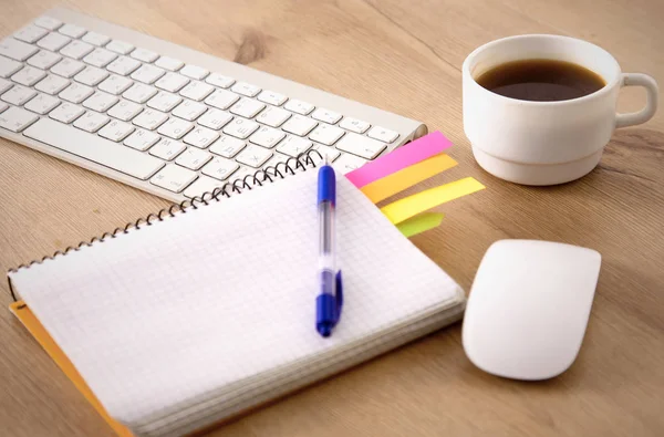 Office table with blank notepad and laptop — Stock Photo, Image