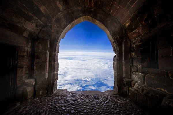 The door open to the world from old place or cave.Let us explore the world, Taking risk, open your vision, get out of cormfort zone concepts. Stock Photo