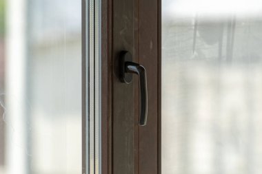 Kapalı Plastik pencere kolu fotoğrafı kapatın