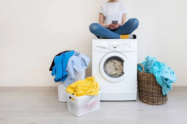 Laundry room interior with washing machine near wall — Stock Photo, Image