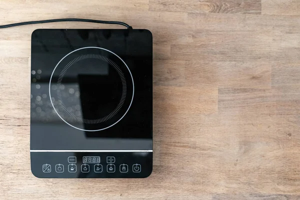 Burner on electric stove with control panel — Stock Photo, Image