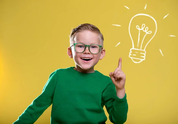 Funny Little Boy Glasses Pointing Yellow Wall Child Elementary School — Stock Photo, Image