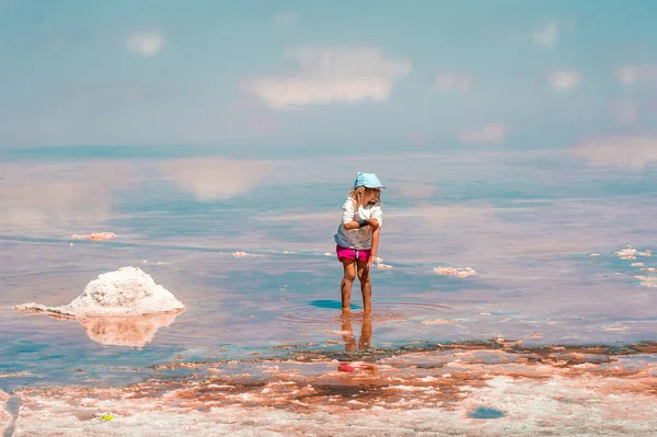 Little kid girl at The Dead Sea, Israel. Salt lake water. healthcare — Stock Photo, Image
