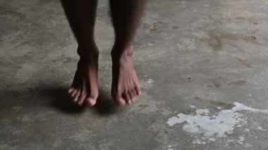 A man is Skipping. Jumping rope, also known as skipping, is a highly effective and accessible full-body workout with a wide range of benefits for your physical and mental health. Slow motion video. 