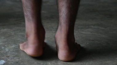 A man is Skipping. Jumping rope, also known as skipping, is a highly effective and accessible full-body workout with a wide range of benefits for your physical and mental health. Slow motion video. 