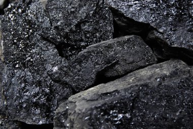 Siyah kömür yığını kapat. Kömür madenciliği