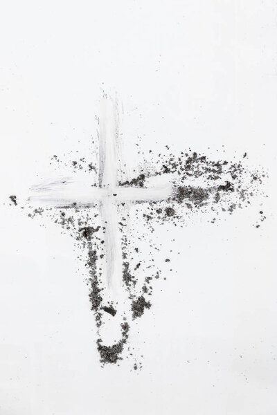 Cross made of ashes, Ash Wednesday, Lent season vintage abstract background