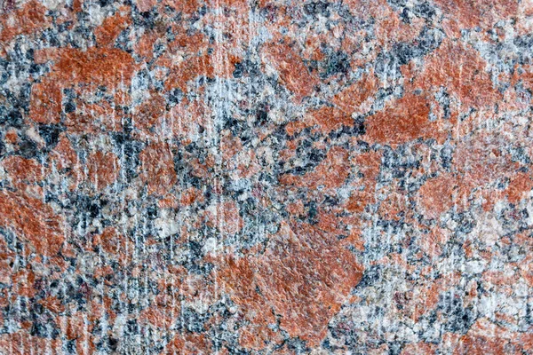 Naturlig berg röd granit bakgrund med impregnering av min — Stockfoto