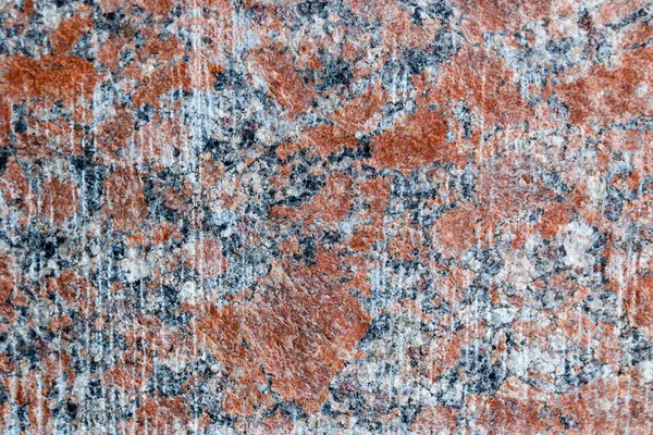 Naturlig berg röd granit bakgrund med impregnering av min — Stockfoto