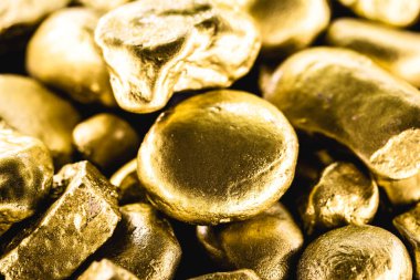 Altın külçesi, değerli taş, altın doku. Ham altın, külçe. Zenginlik ve finansal istikrar kavramı.