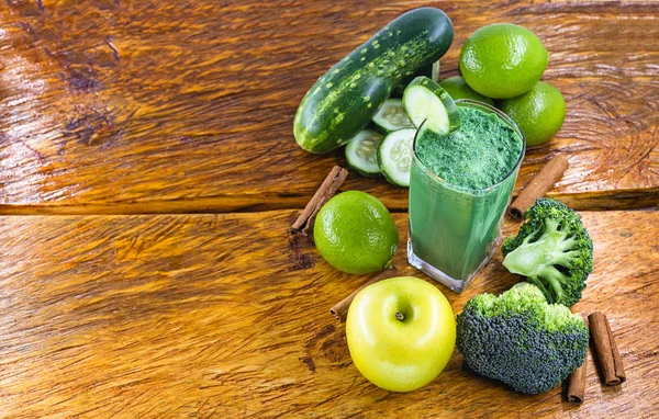 Fresh green juice, detox viterra, Brazilian vegetable juice and green fruits. Drink that has components that favor liver cleansing. Diet or regimen concept. Space for text, banner.