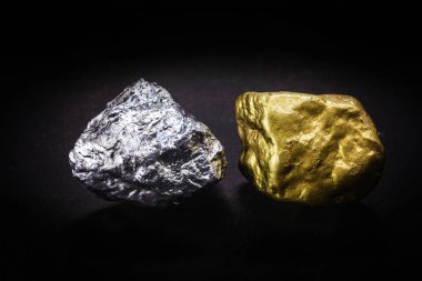 Gold and silver nuggets on black background. Precious stones, luxury concept and mineral drainage. Industrial activity, treasure and fortune. clipart