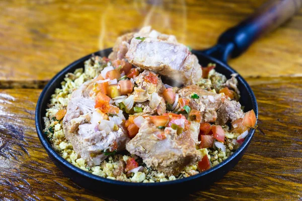 Pork ribs with slight heat vapor, hot food, in Minas Gerais. Typical food of the state of Minas Gerais, Brazil. — Stock Image Pork ribs with slight heat vapor, hot food, in Minas Gerais. Typical food of the state of Minas Gerais, Brazil. Stock Picture