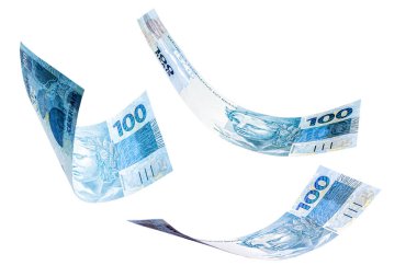 Brezilya 'dan gelen 100 reais' in banknotları izole edilmiş beyaz arka plana düşüyor. Düşen para kavramı, gerçek ya da finansal krizin devalüasyonu.